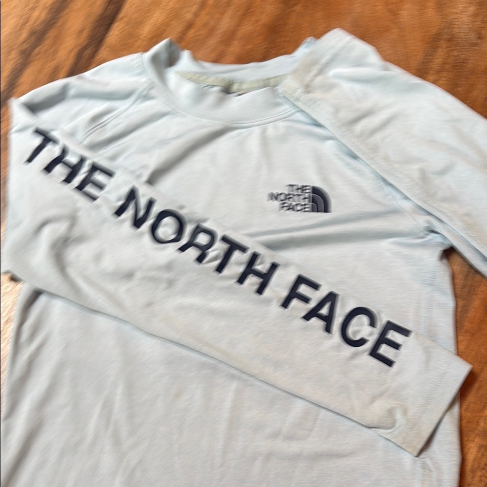 The North Face girls swim shirt